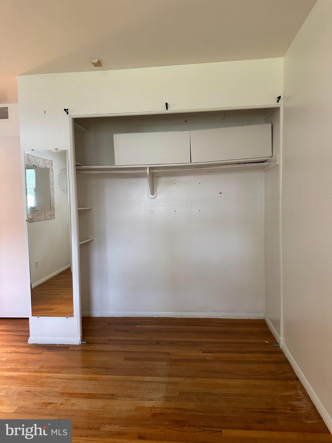 8336 Scotts Level Road Baltimore, MD 21208 - Photo 35 of 55 Spacious closet with mirrored door.