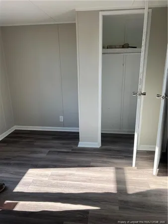 a view of entryway with wooden floor