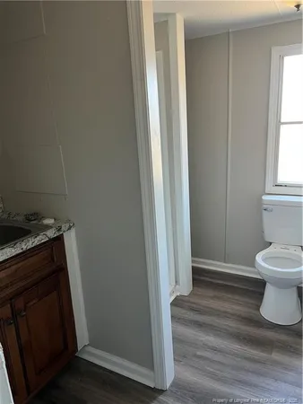 a bathroom with a sink and a toilet