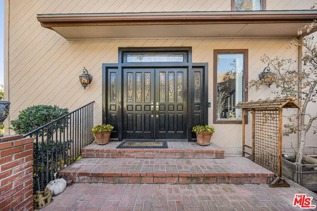 a view of house with outdoor space