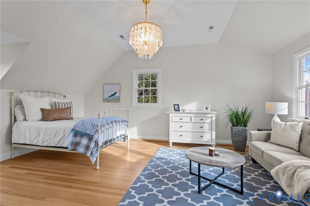 1017 Ridge Top Road Henrico, VA 23229 - Photo 21 of 37 a living room with furniture and a chandelier