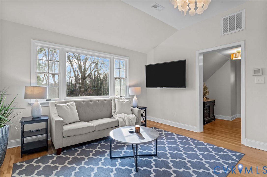 1017 Ridge Top Road Henrico, VA 23229 - Photo 22 of 37 a living room with furniture and a flat screen tv