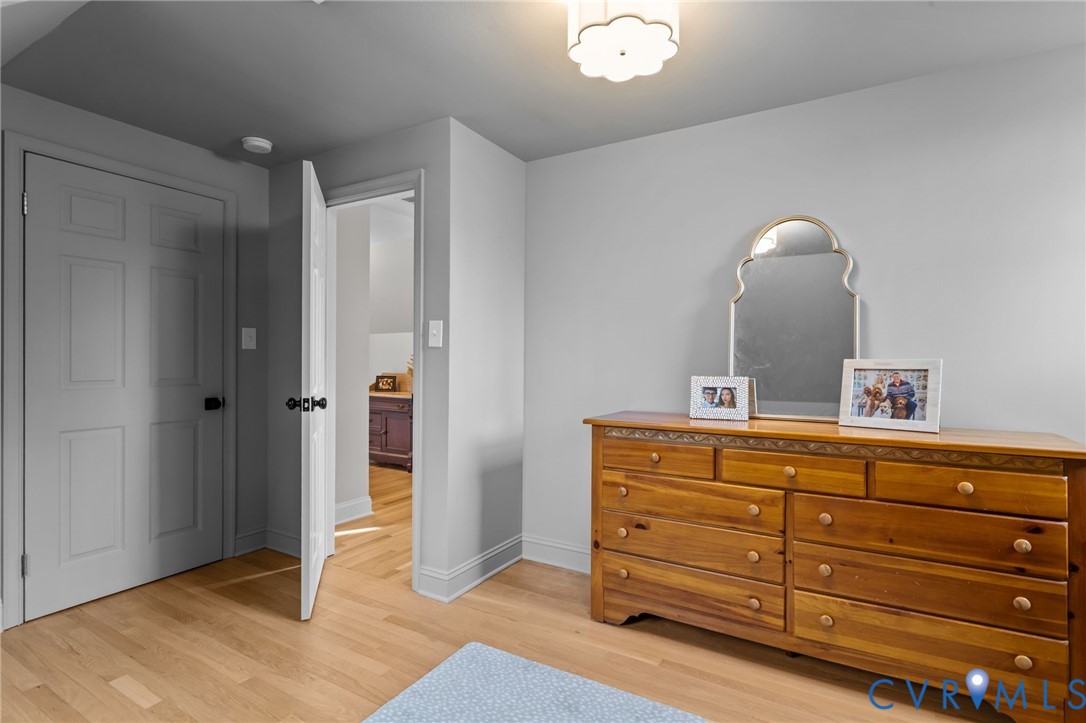 1017 Ridge Top Road Henrico, VA 23229 - Photo 26 of 37 a room with a dresser and a mirror