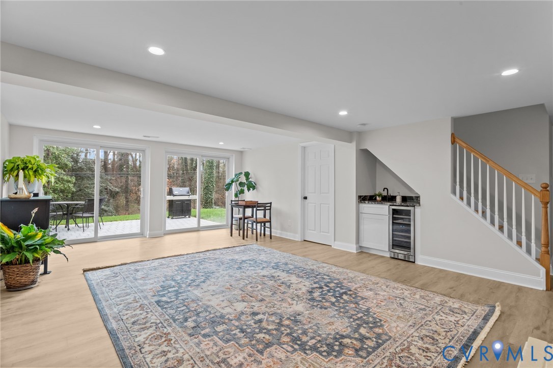 1017 Ridge Top Road Henrico, VA 23229 - Photo 28 of 37 a view of a hallway with wooden floor and furniture