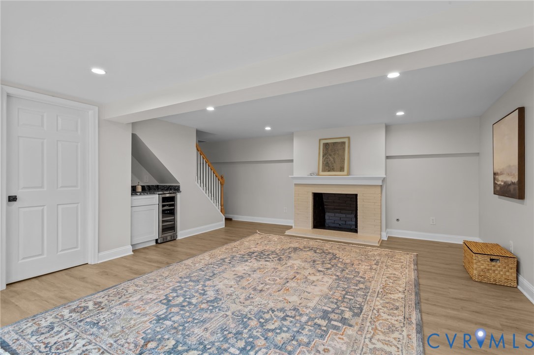 1017 Ridge Top Road Henrico, VA 23229 - Photo 29 of 37 a view of a livingroom with an empty space and a fireplace