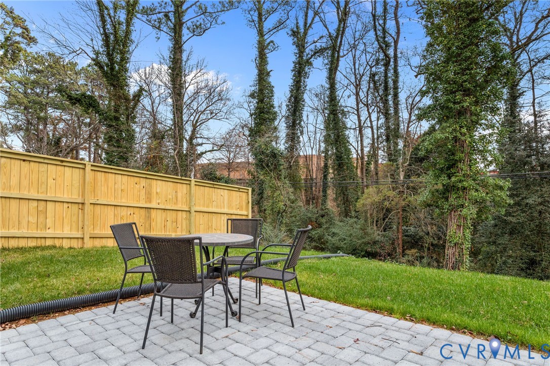 1017 Ridge Top Road Henrico, VA 23229 - Photo 33 of 37 a view of backyard with seating and green space