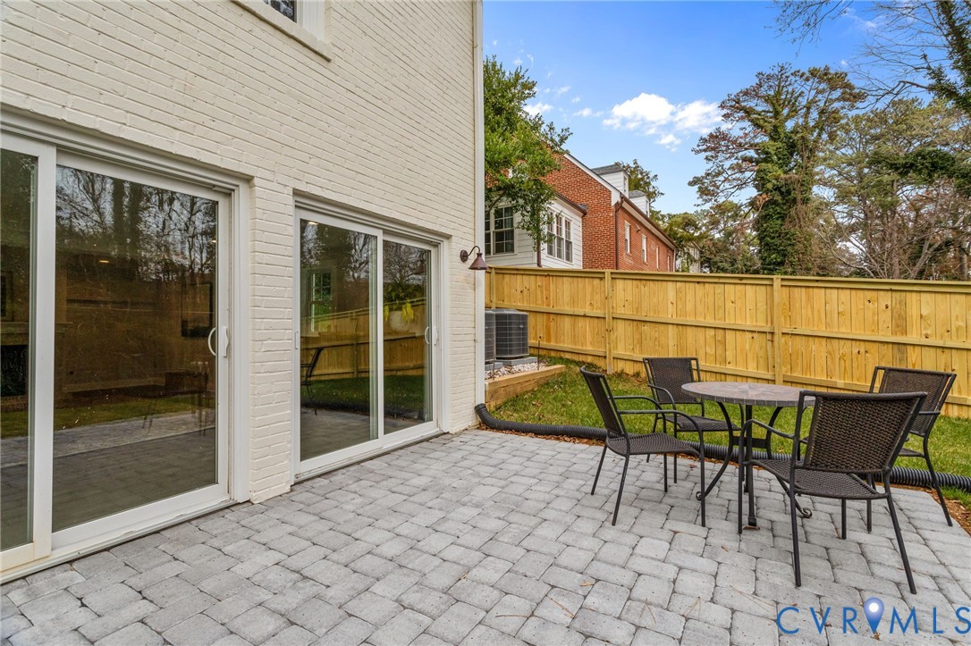1017 Ridge Top Road Henrico, VA 23229 - Photo 34 of 37 a view of a patio with table and chairs and potted plants