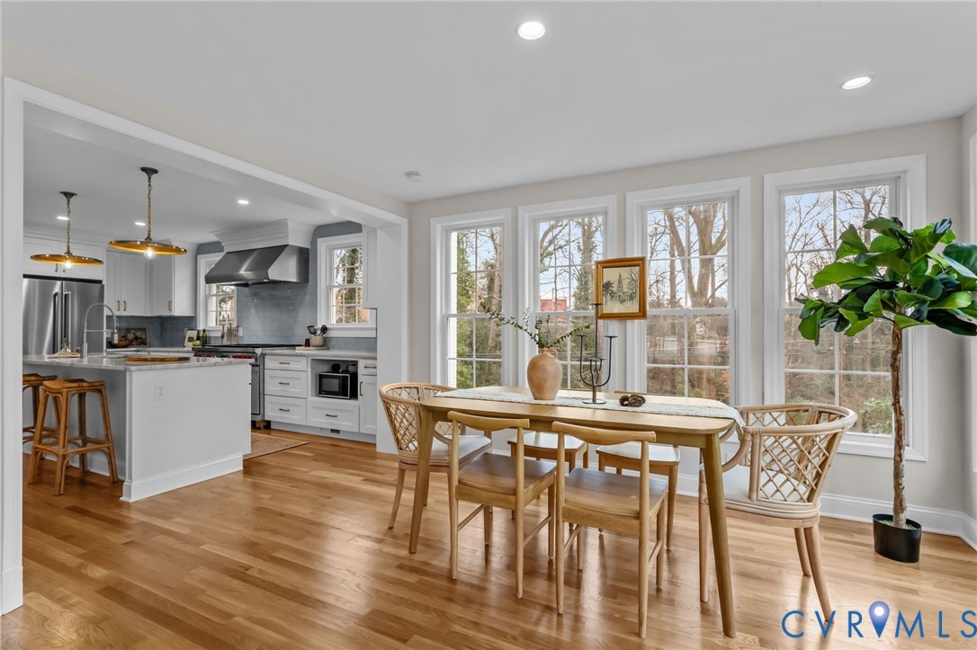 1017 Ridge Top Road Henrico, VA 23229 - Photo 10 of 37 a living room with furniture and a large window with kitchen view
