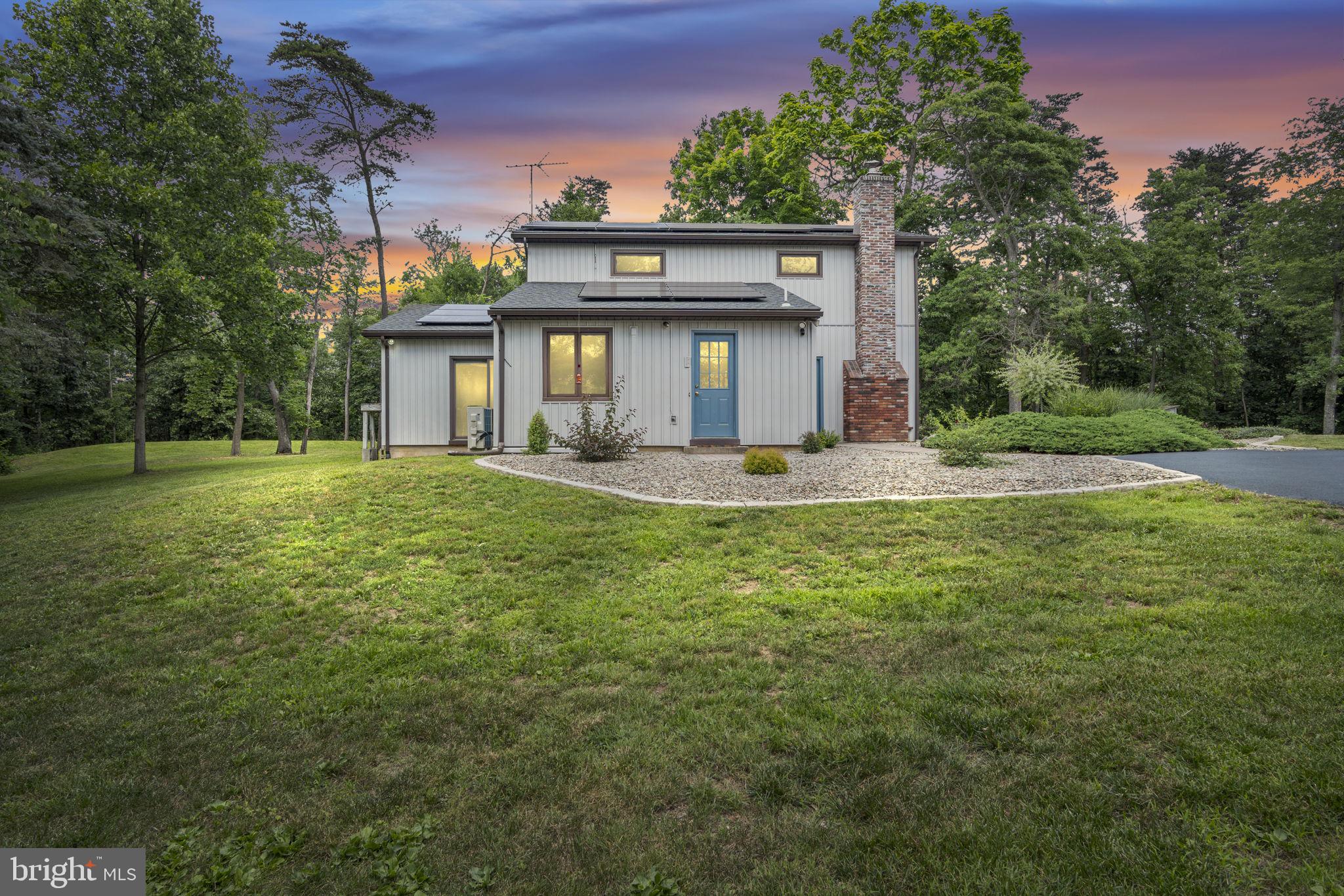 1911 Longs Gap Road Carlisle, PA 17013 - Photo 2 of 78 Charming home amid lush greenery.