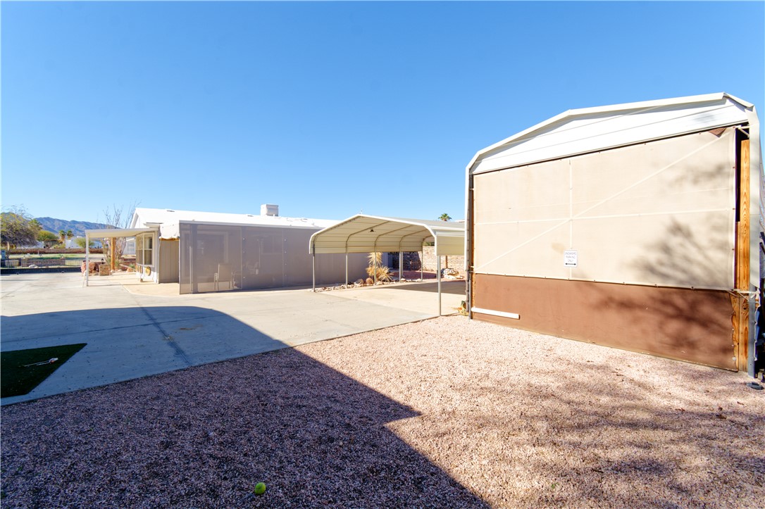 49603 Rainbow Avenue Quartzsite, AZ 85346 - Photo 3 of 44 View of yard with a carport