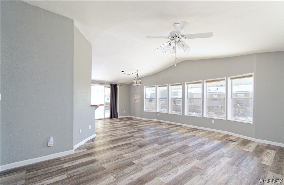 49603 Rainbow Avenue Quartzsite, AZ 85346 - Photo 6 of 44 Spare room featuring ceiling fan and light wood-style floors