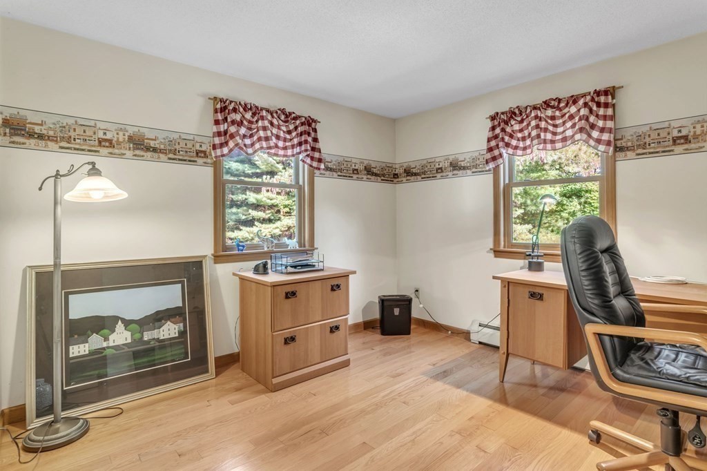 87 Cote Road Monson, MA 01057 - Photo 7 of 30 a living room with furniture and a fireplace