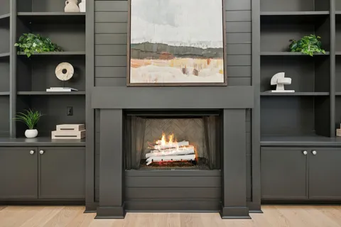 a kitchen with a sink a refrigerator and window