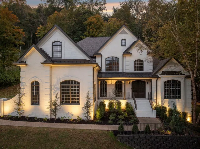 a view of house with garden