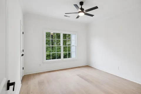 a bathroom with a double vanity sink and mirror