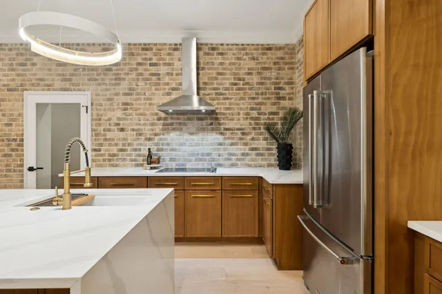 a backyard of a house with yard and outdoor seating