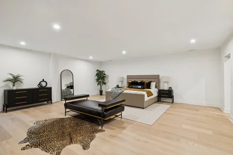 a view of a chairs and table in backyard of the house
