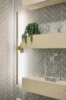 a living room with a fireplace and a flat screen tv