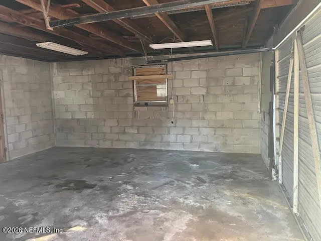 a view of car parked on road with trees