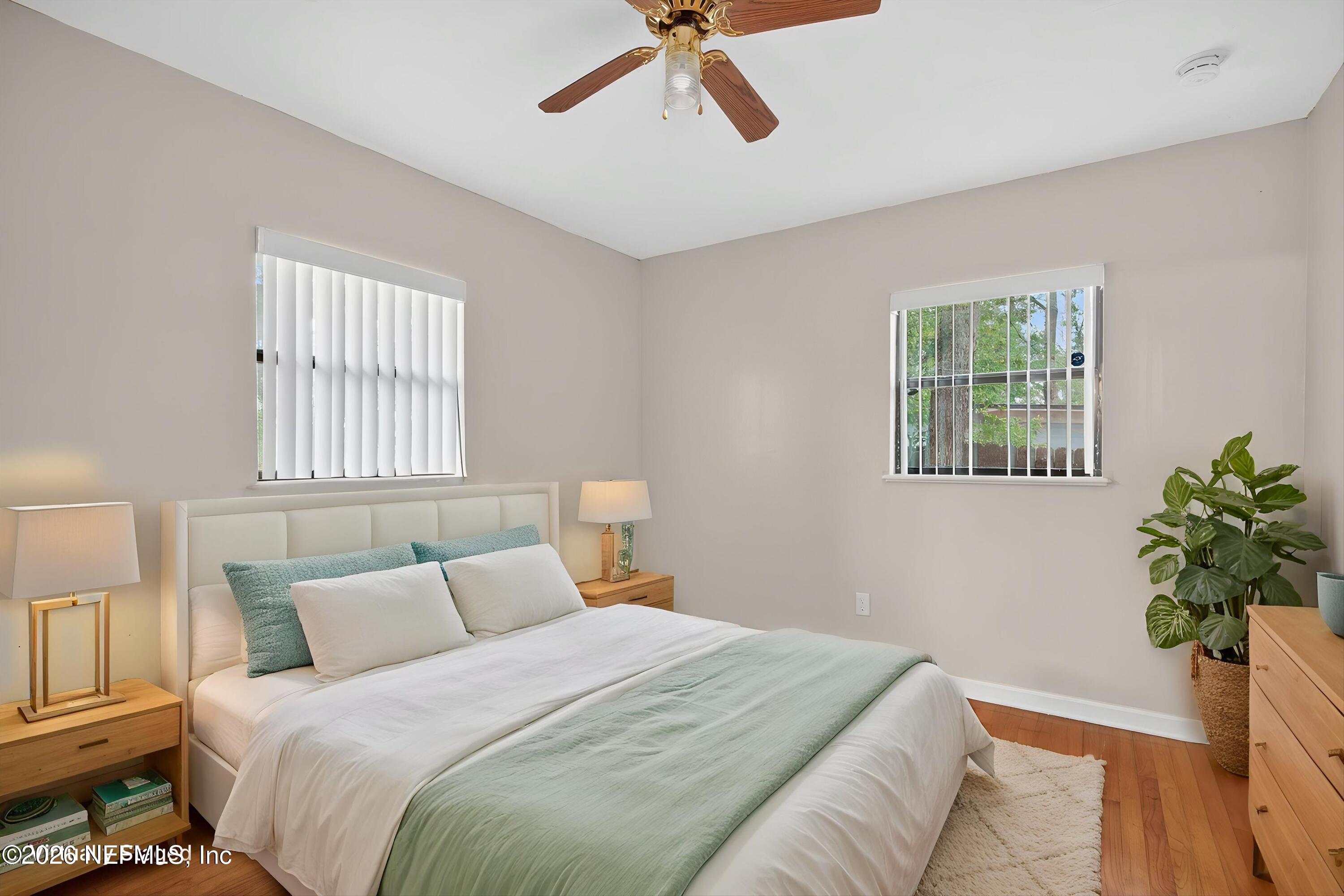 4231 Rendale Drive North Jacksonville, FL 32210 - Photo 19 of 37 a bedroom with a bed and a window