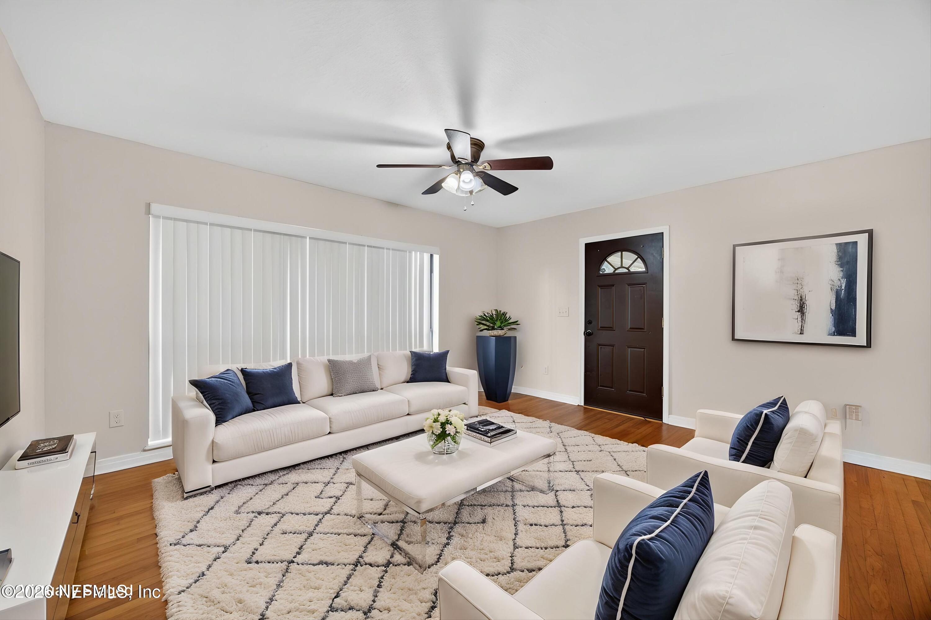 4231 Rendale Drive North Jacksonville, FL 32210 - Photo 2 of 37 a living room with furniture and a rug