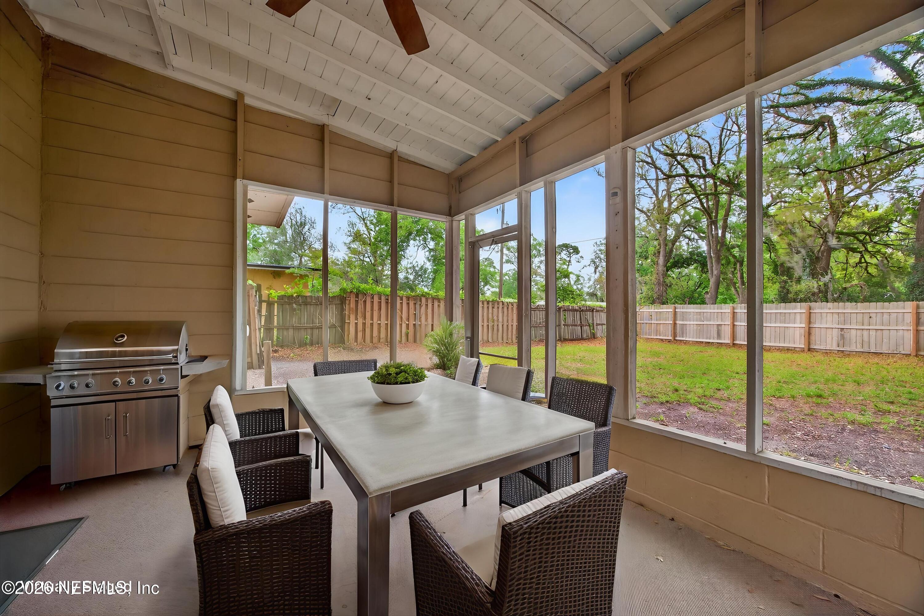 4231 Rendale Drive North Jacksonville, FL 32210 - Photo 31 of 37 a view of a dining room with furniture window and outside view
