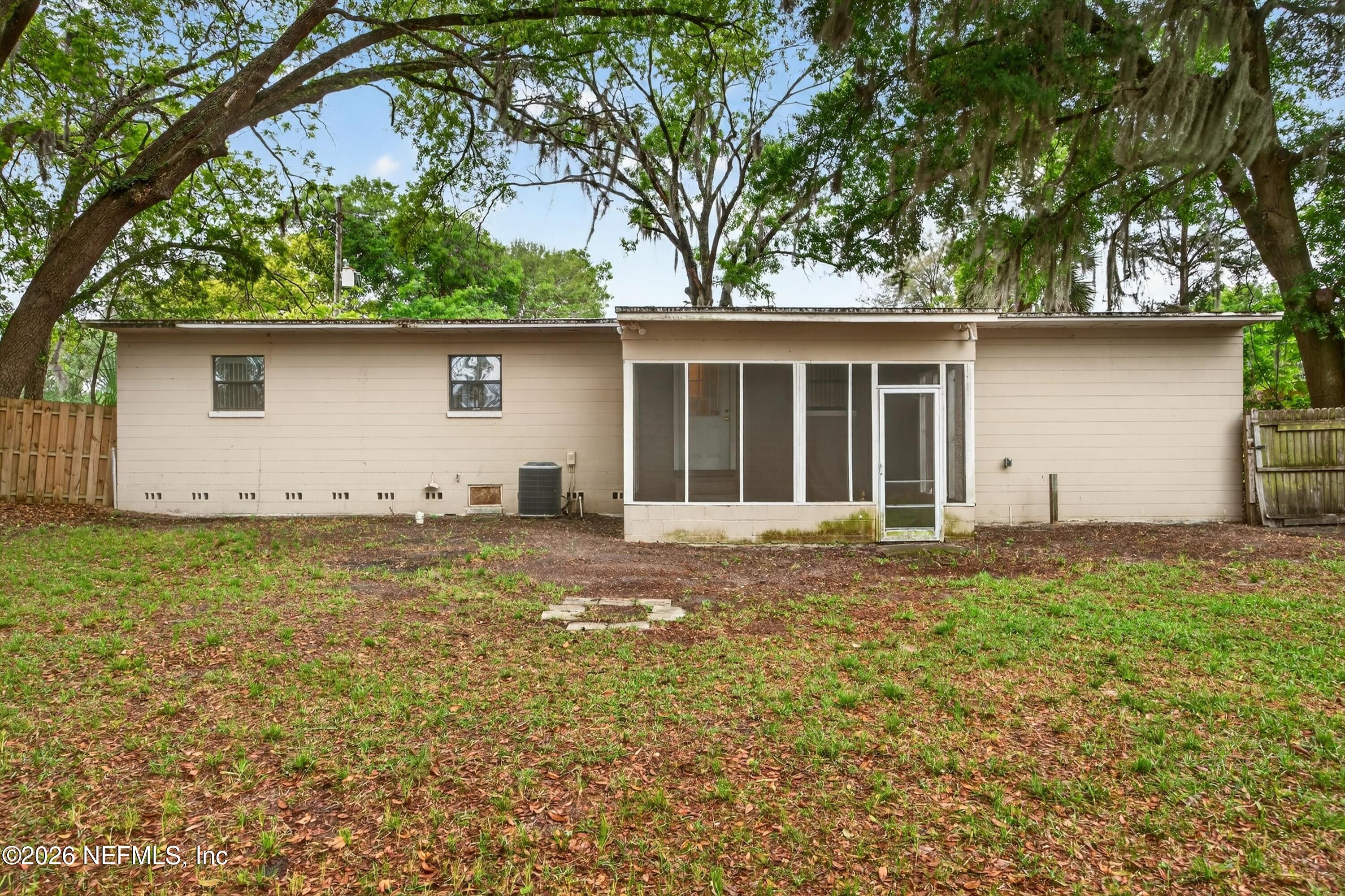 4231 Rendale Drive North Jacksonville, FL 32210 - Photo 35 of 37 a house that has a tree in front of it