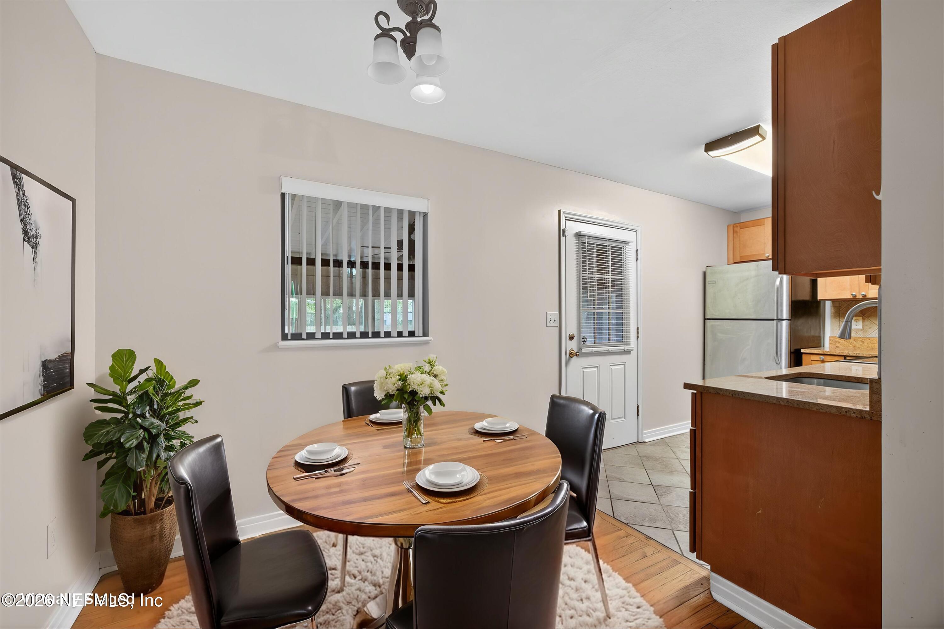 4231 Rendale Drive North Jacksonville, FL 32210 - Photo 4 of 37 a dining room with furniture and window