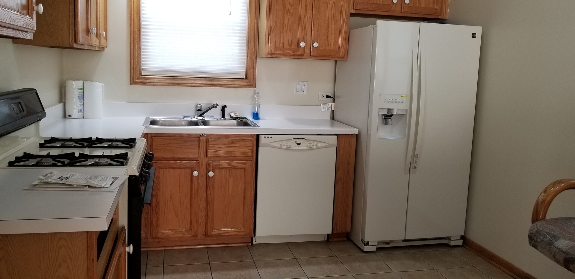 17613 Howe Avenue Homewood, IL 60430 - Photo 5 of 16 a kitchen with a sink stove and refrigerator