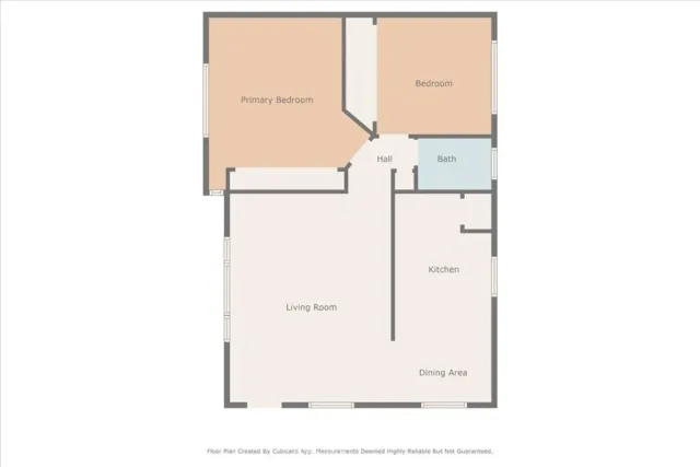 a view of a house with a wooden fence