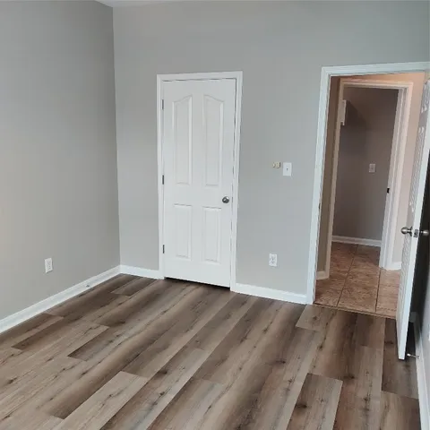 a view of a room with rack on the wall