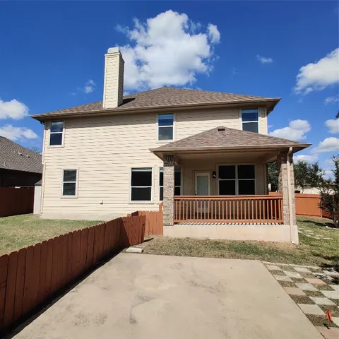 a view of a city street from a balcony