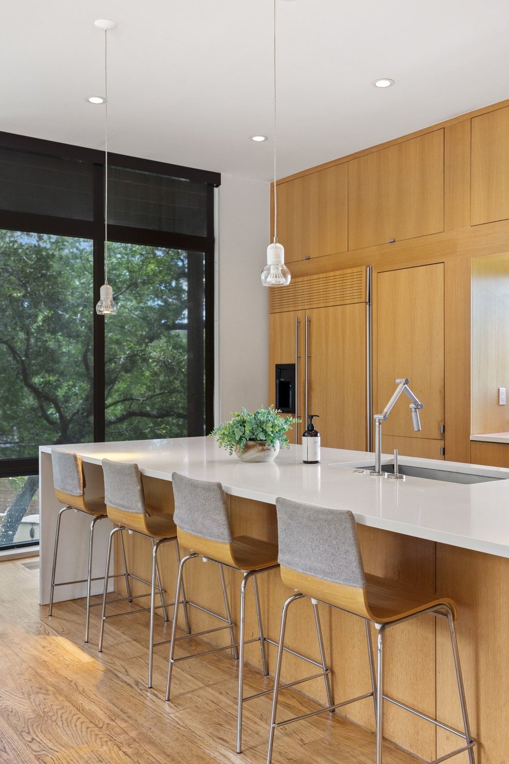 801 The High Road Austin, TX 78746 - Photo 11 of 40 a view of a dining room with furniture window and outside view