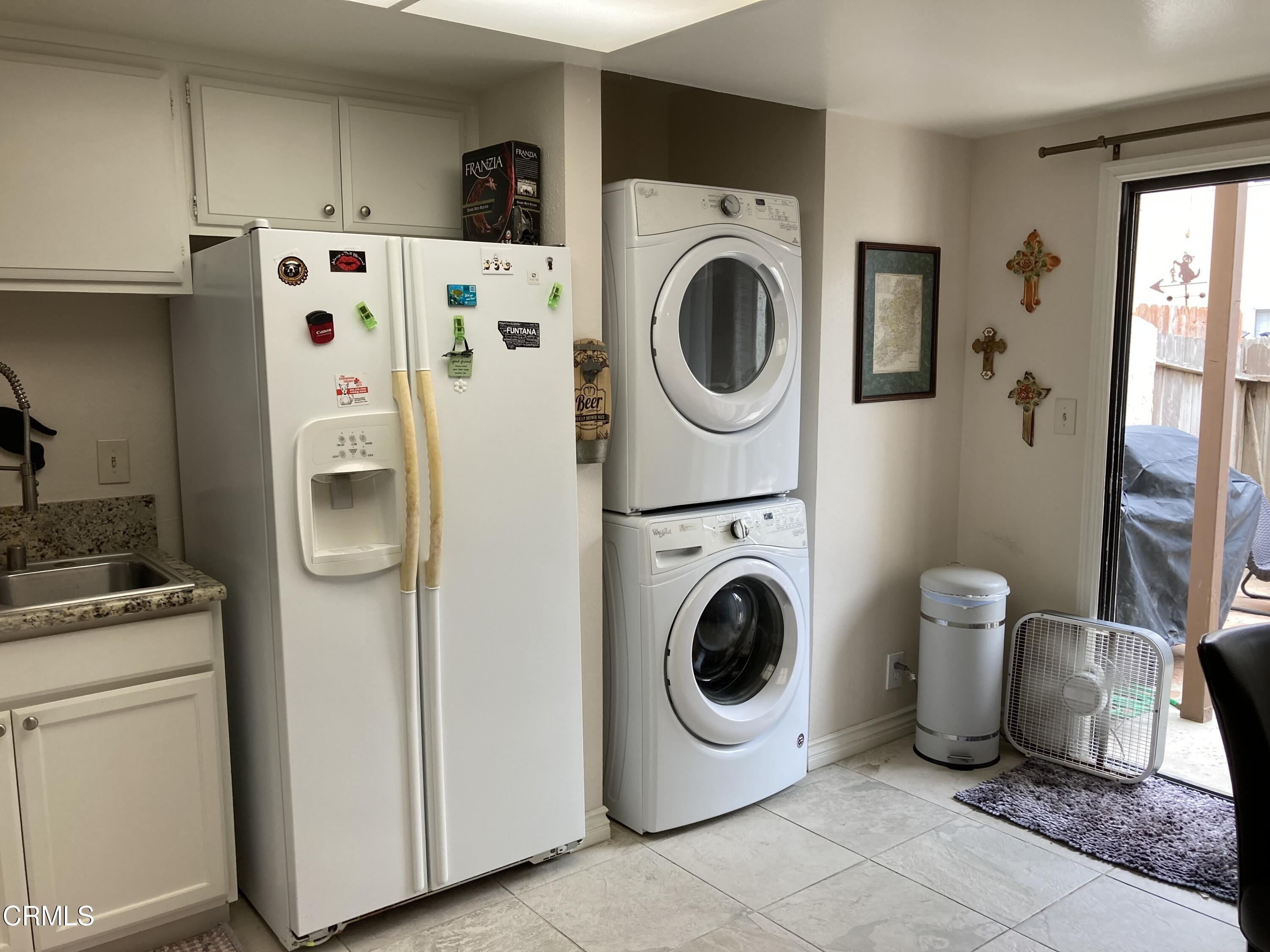 5130 West Wooley Road, Unit 2 Oxnard, CA 93035 - Photo 7 of 11 a bedroom with bed and a window
