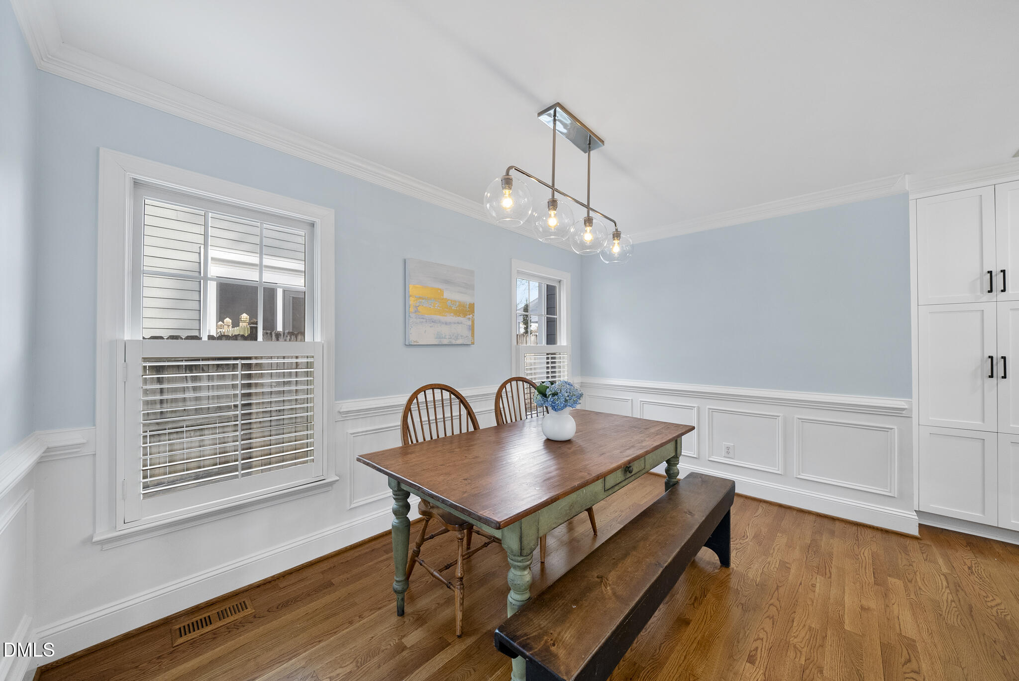 325 Morrison Avenue Raleigh, NC 27608 - Photo 14 of 42 a view of a workspace with wooden floor and a window