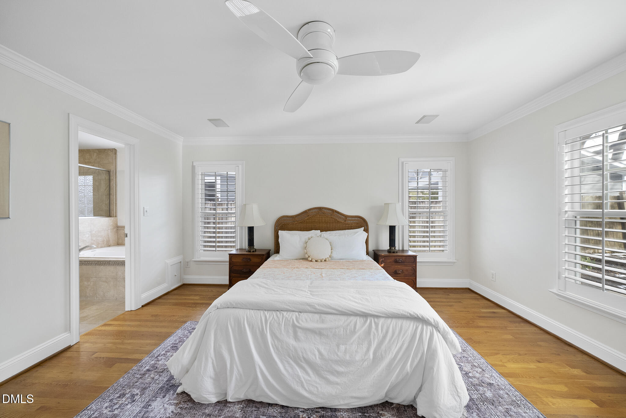 325 Morrison Avenue Raleigh, NC 27608 - Photo 16 of 42 a bedroom with a bed and a window