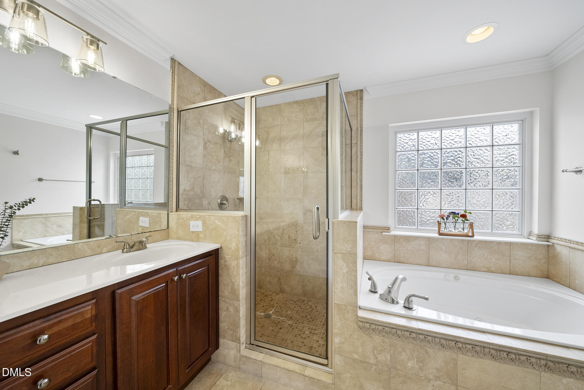 325 Morrison Avenue Raleigh, NC 27608 - Photo 19 of 42 a bathroom with a tub sink and mirror