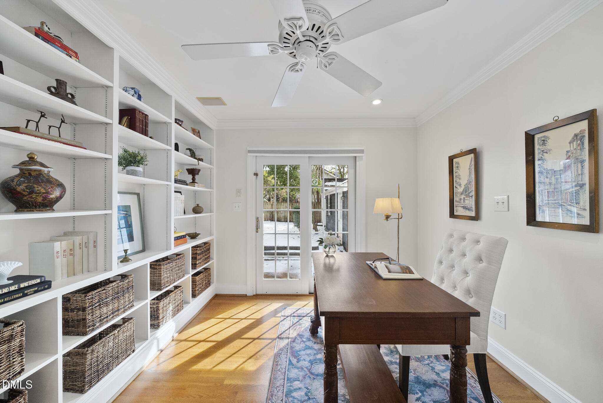 325 Morrison Avenue Raleigh, NC 27608 - Photo 21 of 42 a view of a dining room with furniture and chandelier