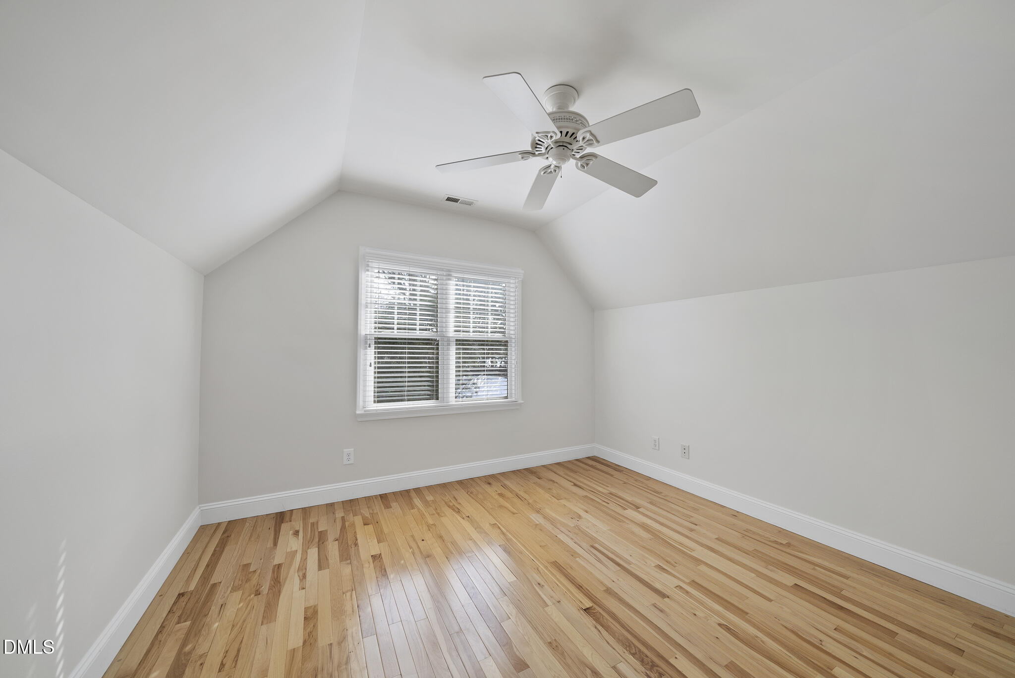 325 Morrison Avenue Raleigh, NC 27608 - Photo 30 of 42 wooden floor in an empty room with a window