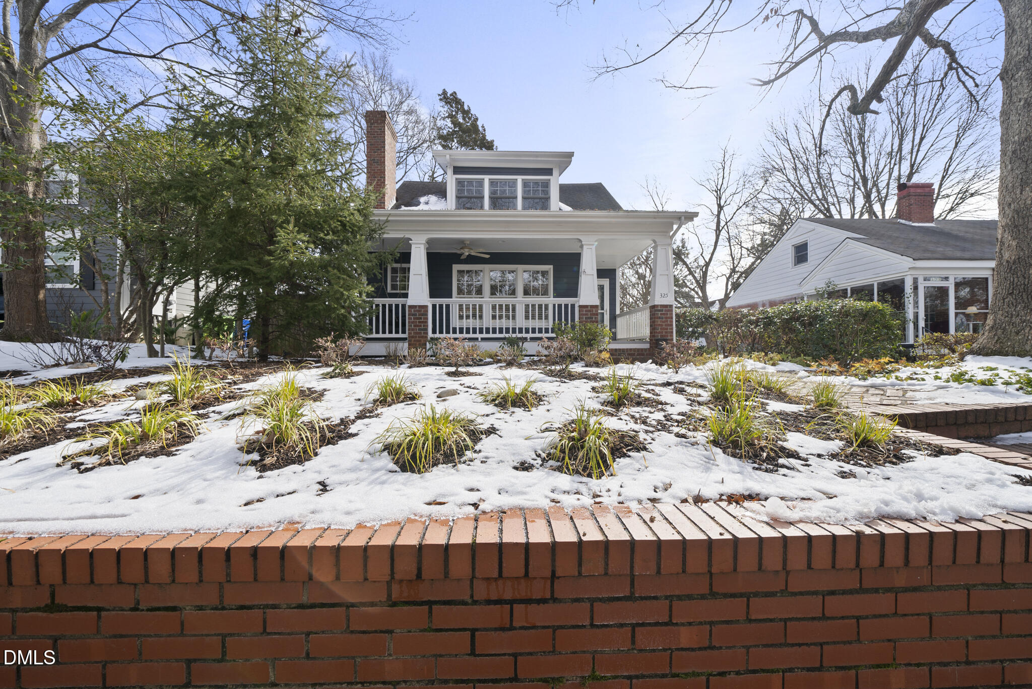 325 Morrison Avenue Raleigh, NC 27608 - Photo 38 of 42 a front view of a house with a yard