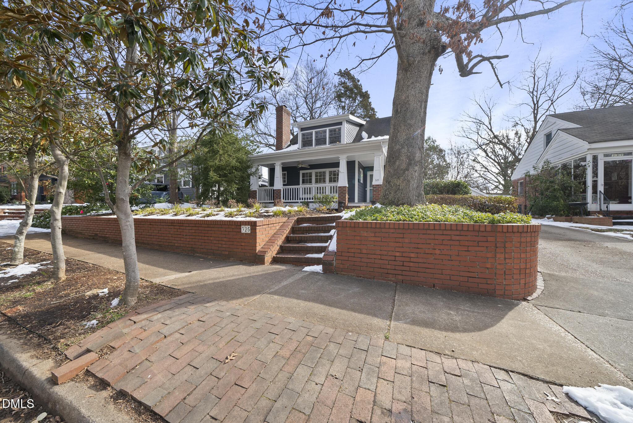325 Morrison Avenue Raleigh, NC 27608 - Photo 39 of 42 a backyard of a house with barbeque oven fire pit table and chairs