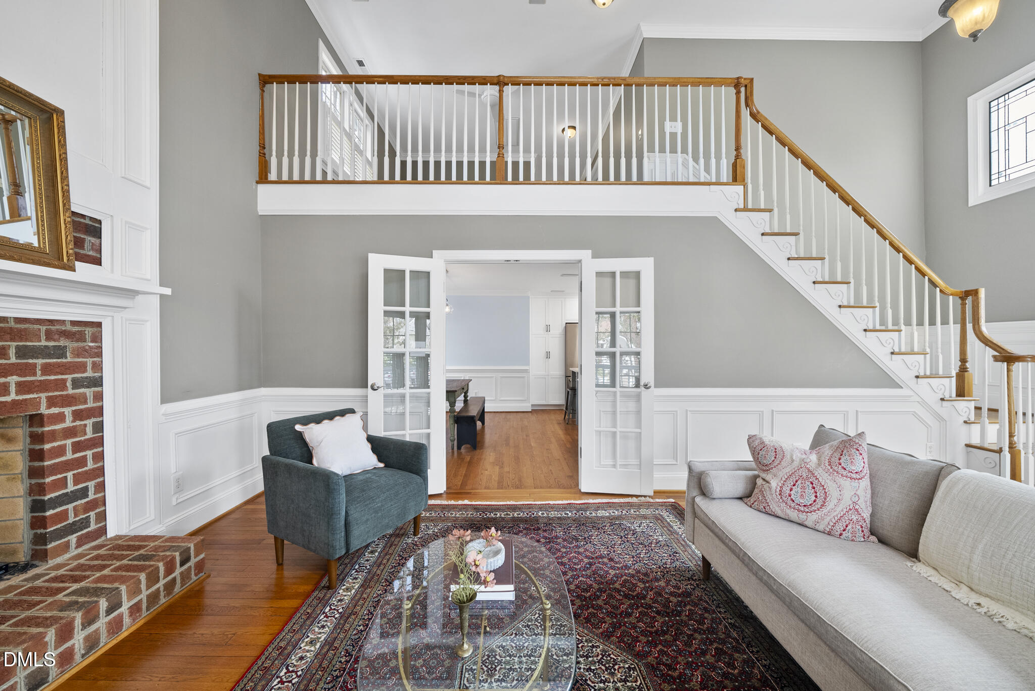 325 Morrison Avenue Raleigh, NC 27608 - Photo 4 of 42 a living room with furniture and a rug