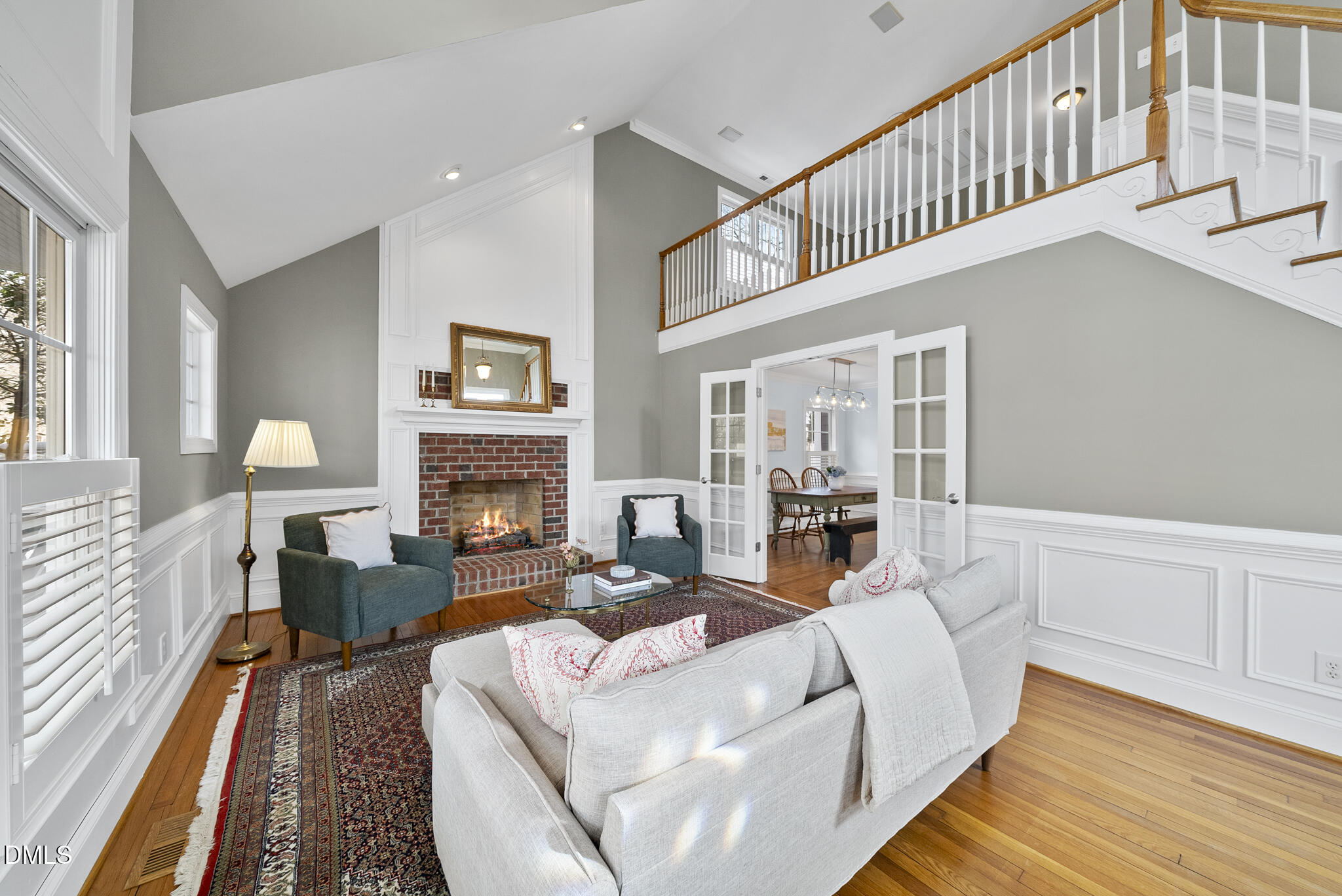 325 Morrison Avenue Raleigh, NC 27608 - Photo 6 of 42 a living room with furniture and a fireplace