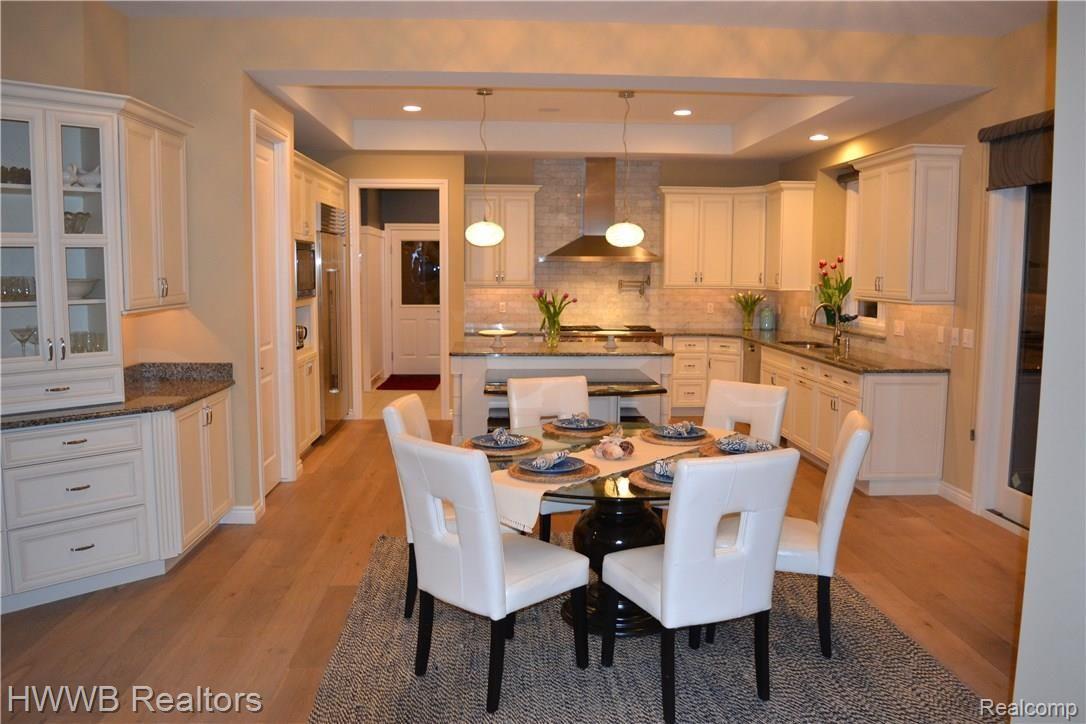 5676 Sovereign Drive Rochester, MI 48306 - Photo 19 of 68 Breakfast Room to Kitchen