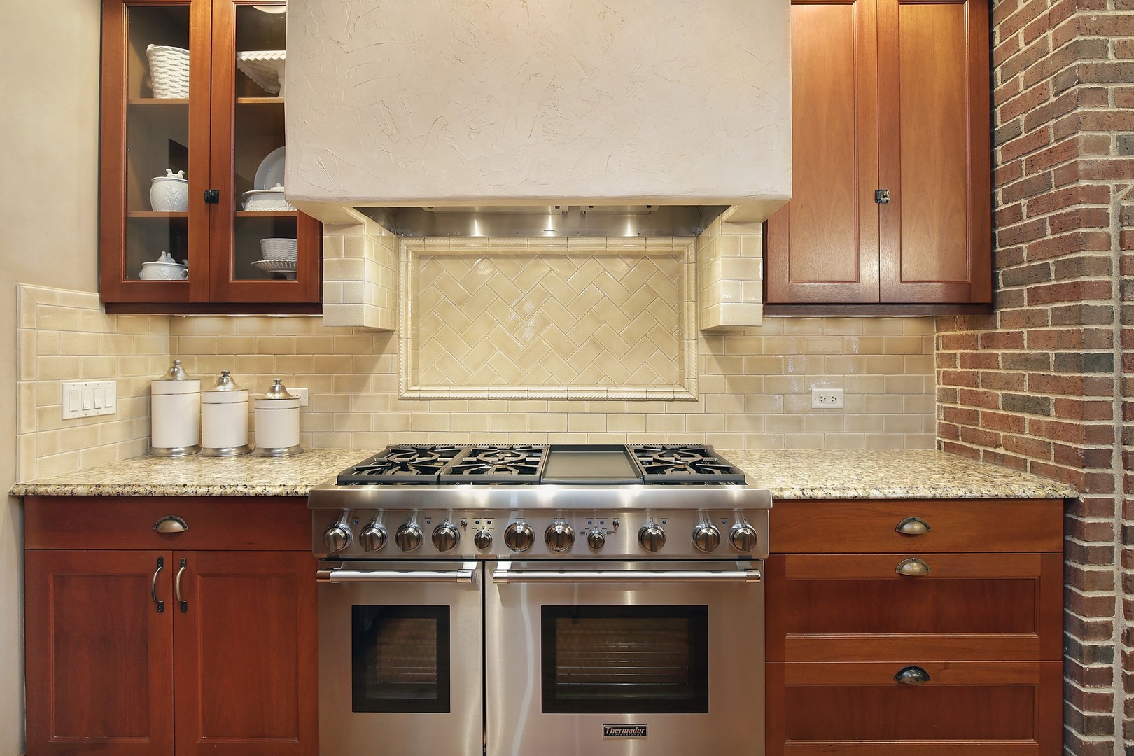 15 Old Green Bay Road Winnetka, IL 60093 - Photo 13 of 60 a stove top oven sitting inside of a kitchen