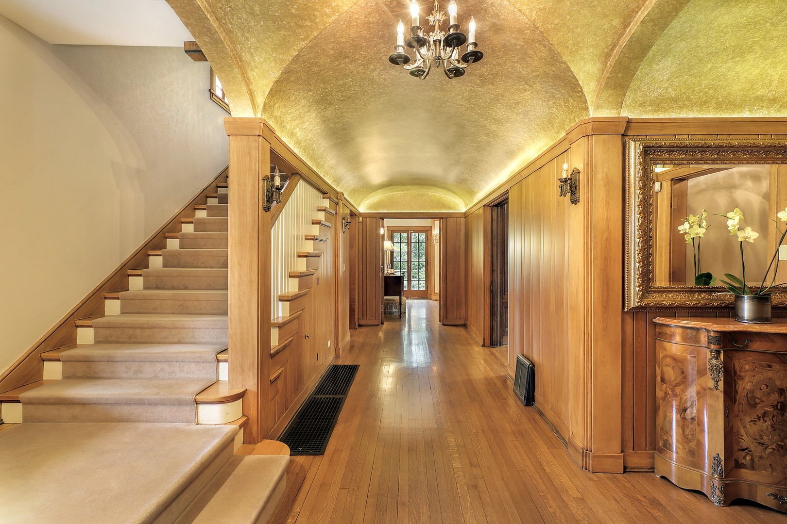 15 Old Green Bay Road Winnetka, IL 60093 - Photo 15 of 60 a view of a hallway view with wooden floor and staircase