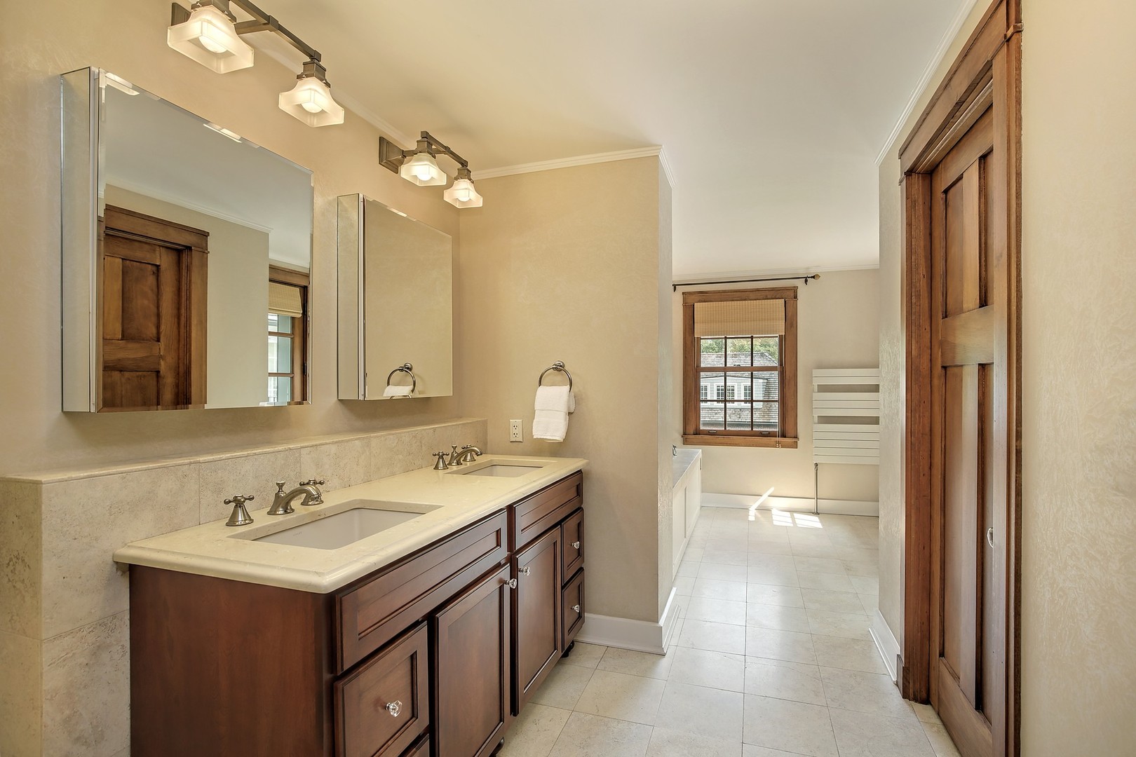 15 Old Green Bay Road Winnetka, IL 60093 - Photo 19 of 60 a bathroom with a sink vanity and a mirror