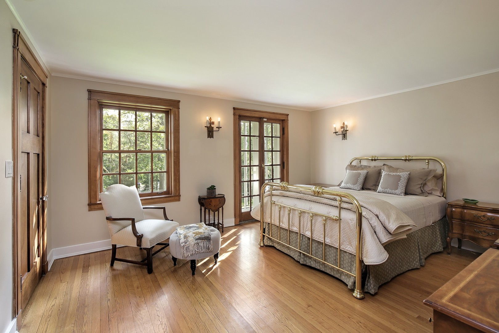 15 Old Green Bay Road Winnetka, IL 60093 - Photo 22 of 60 a spacious bedroom with a bed and wooden floor