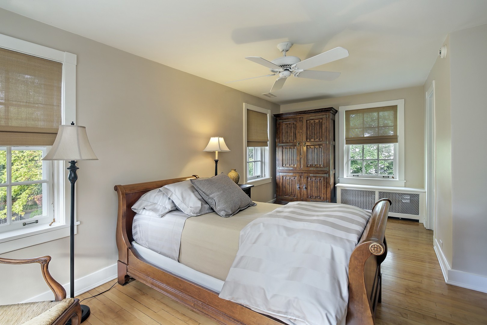 15 Old Green Bay Road Winnetka, IL 60093 - Photo 25 of 60 a bedroom with a large bed and a large window
