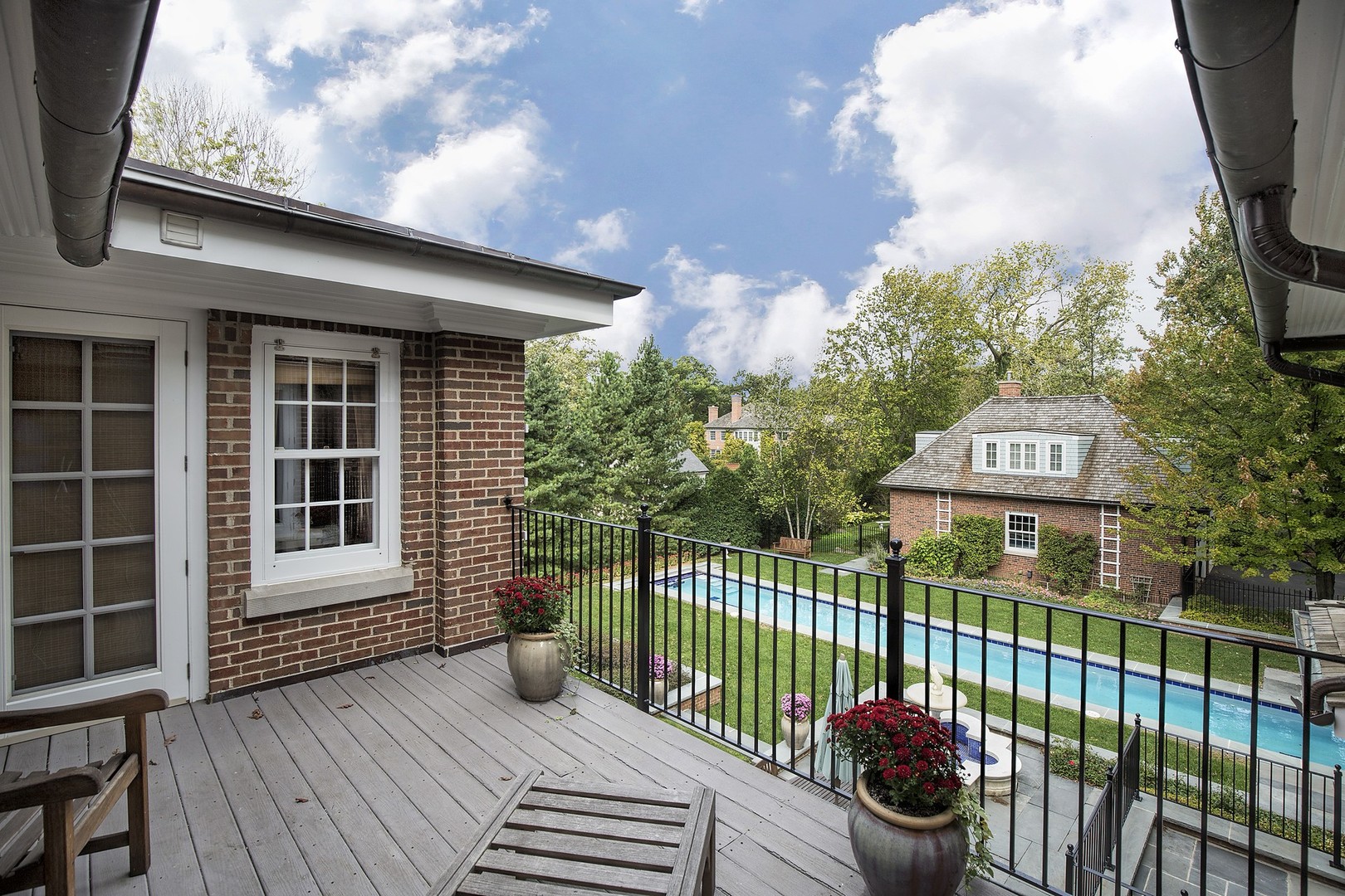 15 Old Green Bay Road Winnetka, IL 60093 - Photo 26 of 60 a view of a house with a small yard and wooden fence